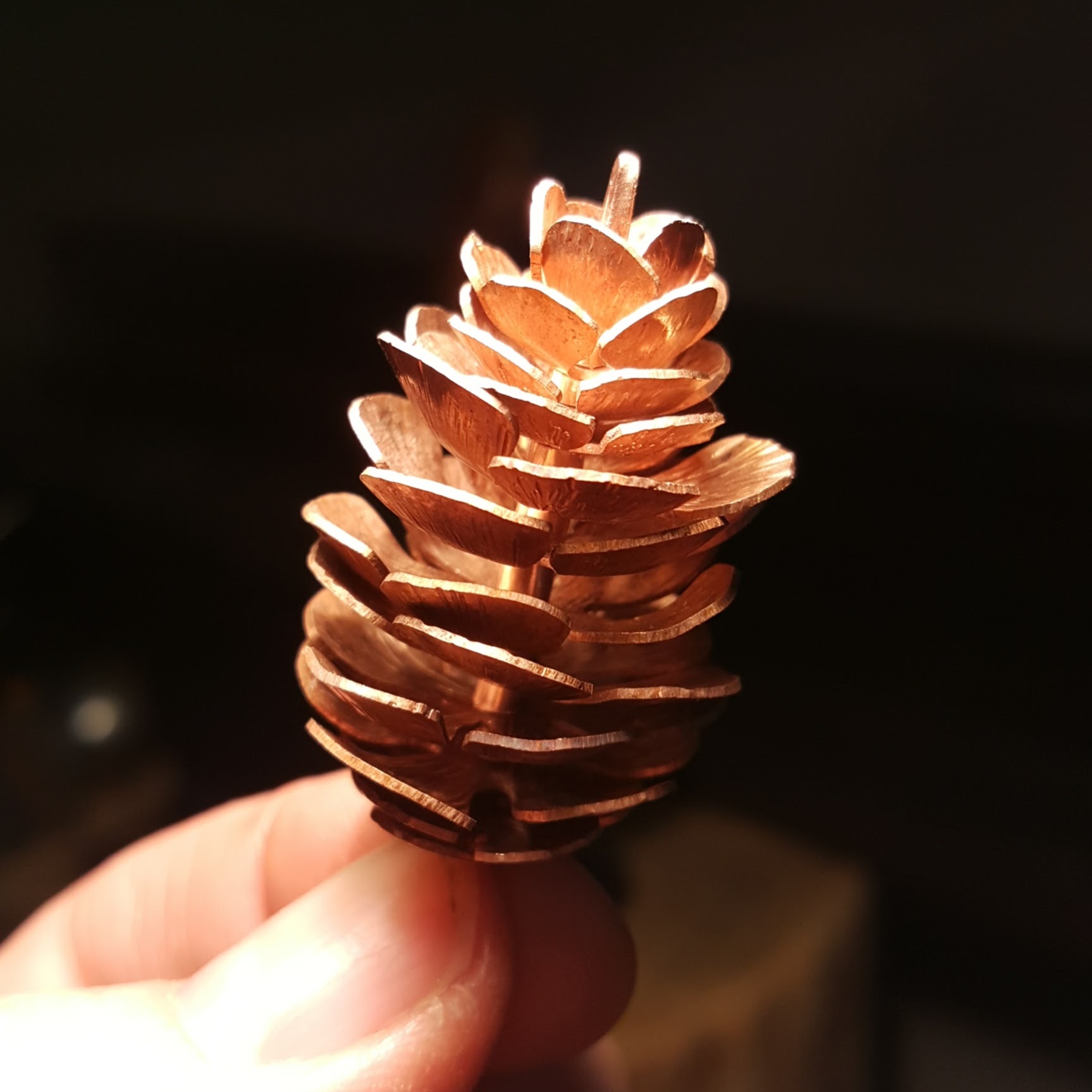A copper spruce pine cone