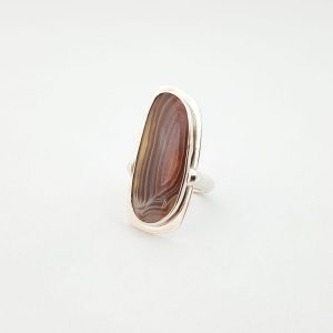 The face of a botswana agate ring set in silver