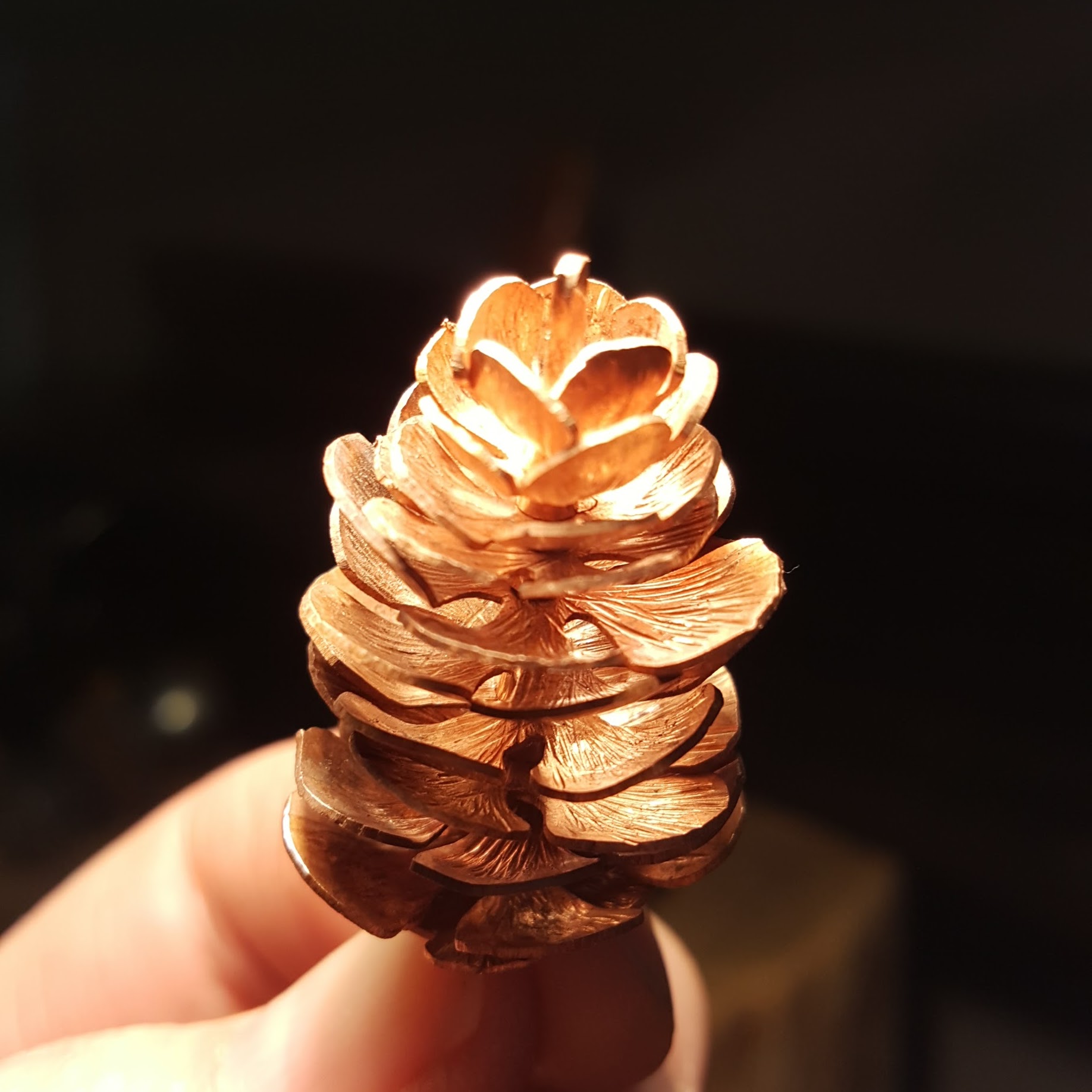 A copper pine cone