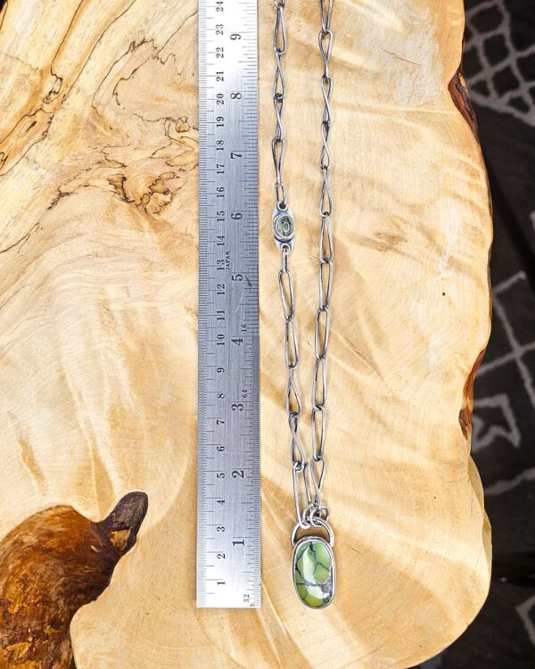 GreenTurquoiseNecklaceRuler-opt A green turquoise pendant on a handmade silver chain. A Prehenite cabochon is set in the chain to accent the green of the turquoise