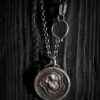 WinterLandscape3-opt The pendant hanging on a black wood background